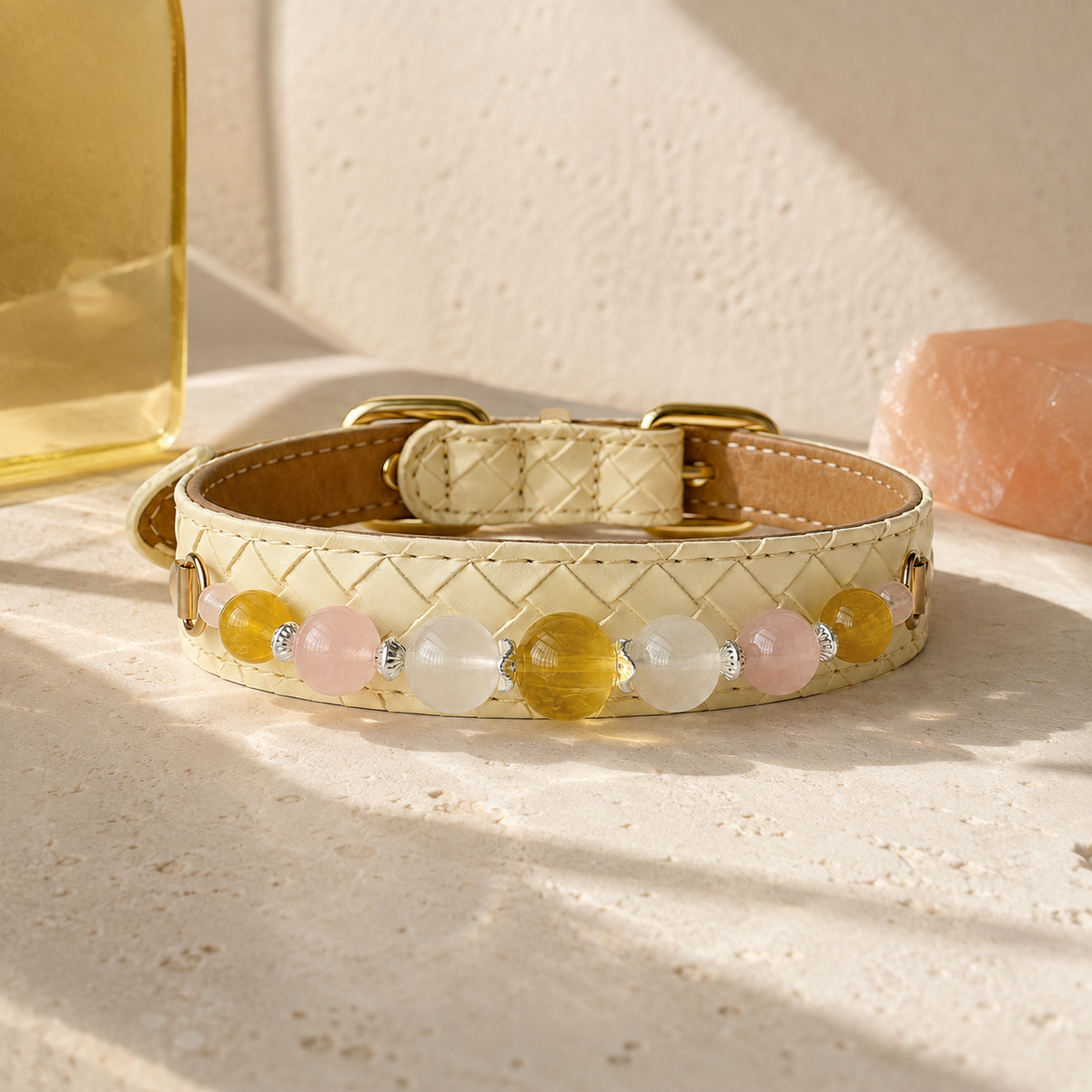 Aurelia Blush pet jewelry collar arranged in a warm ivory and blush editorial still life.