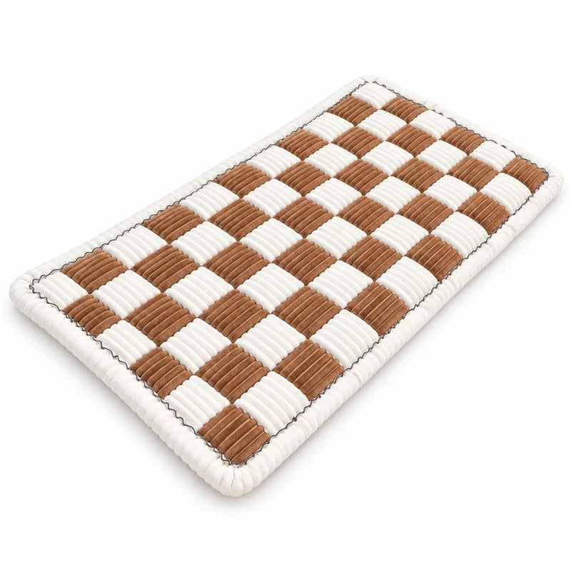 Brown and cream checkerboard pet sofa mat on white