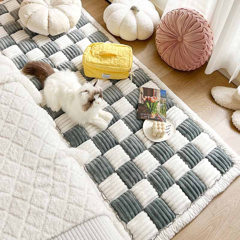 Grey and cream ribbed checkerboard mat shown as a floor resting area