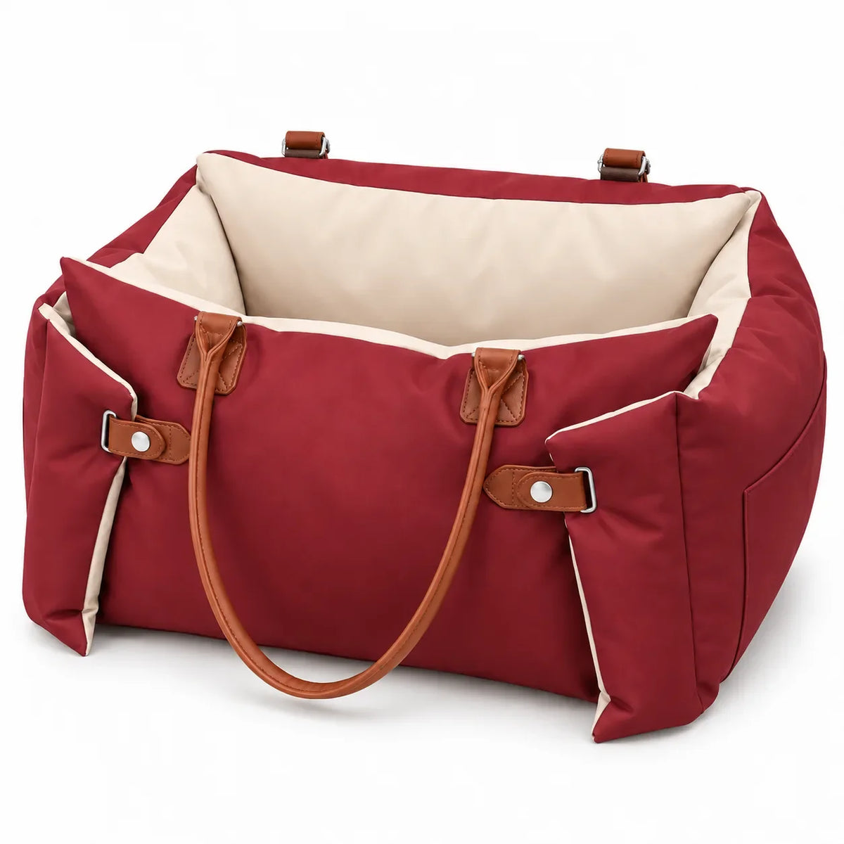 Red pet travel carrier with cream lining and tan carrying handles