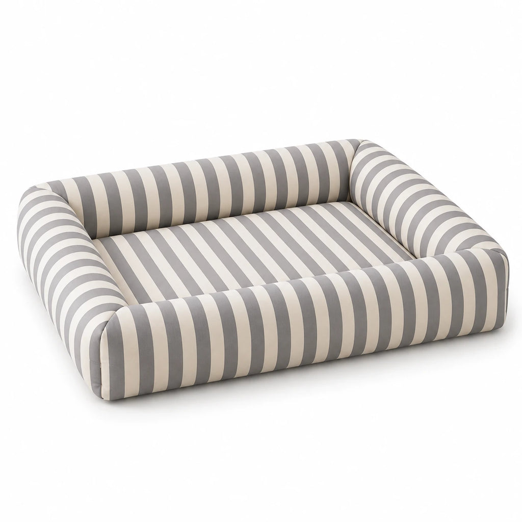 Soft Gray and cream striped Oxford pet bed on a white background