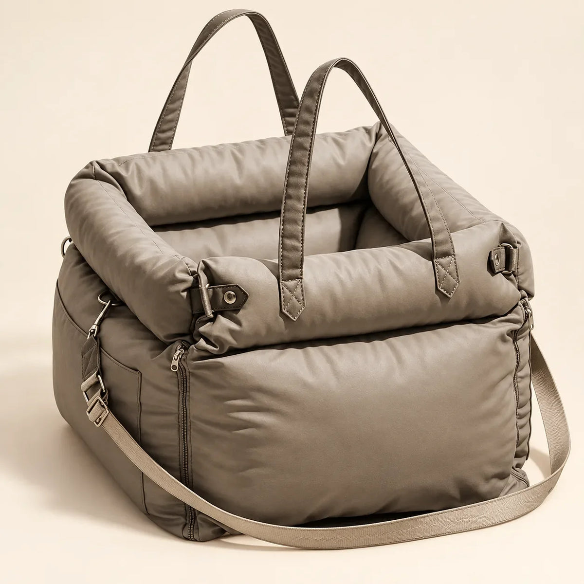 Grey pet travel carrier with padded sides, carrying handles and shoulder strap