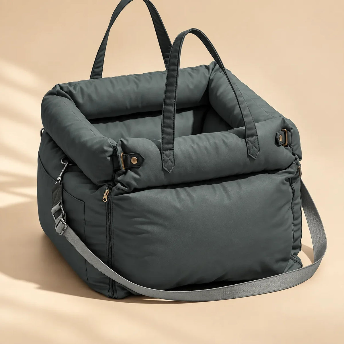 Blue grey pet travel carrier with padded sides, carrying handles and shoulder strap