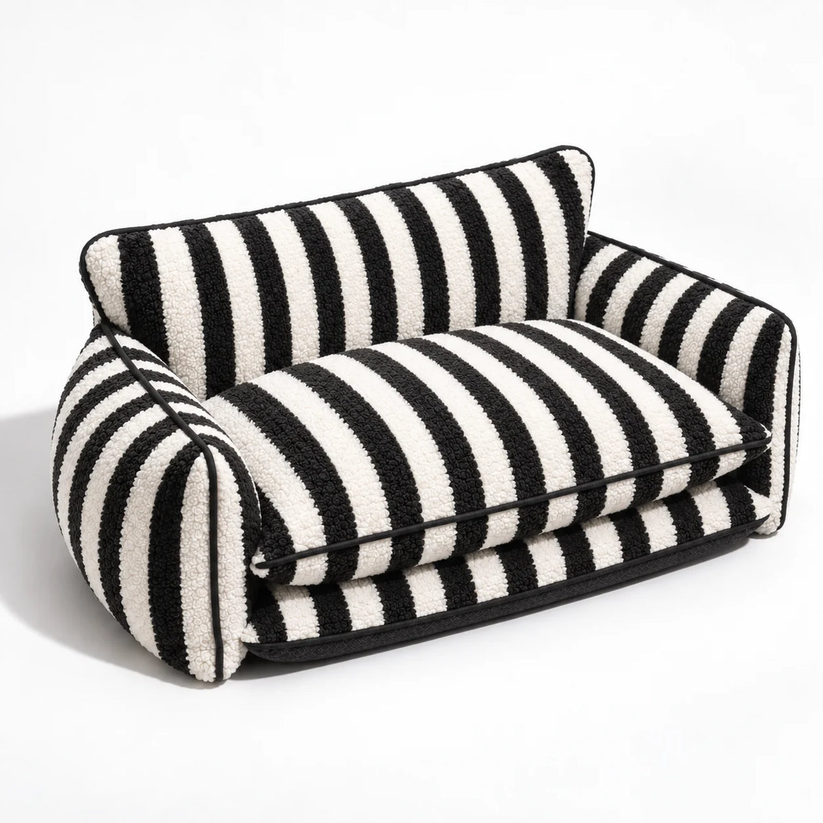 Black and ivory striped faux lambswool double-layer pet sofa bed shown alone on a white studio background